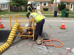 Preparing to enter a manhole