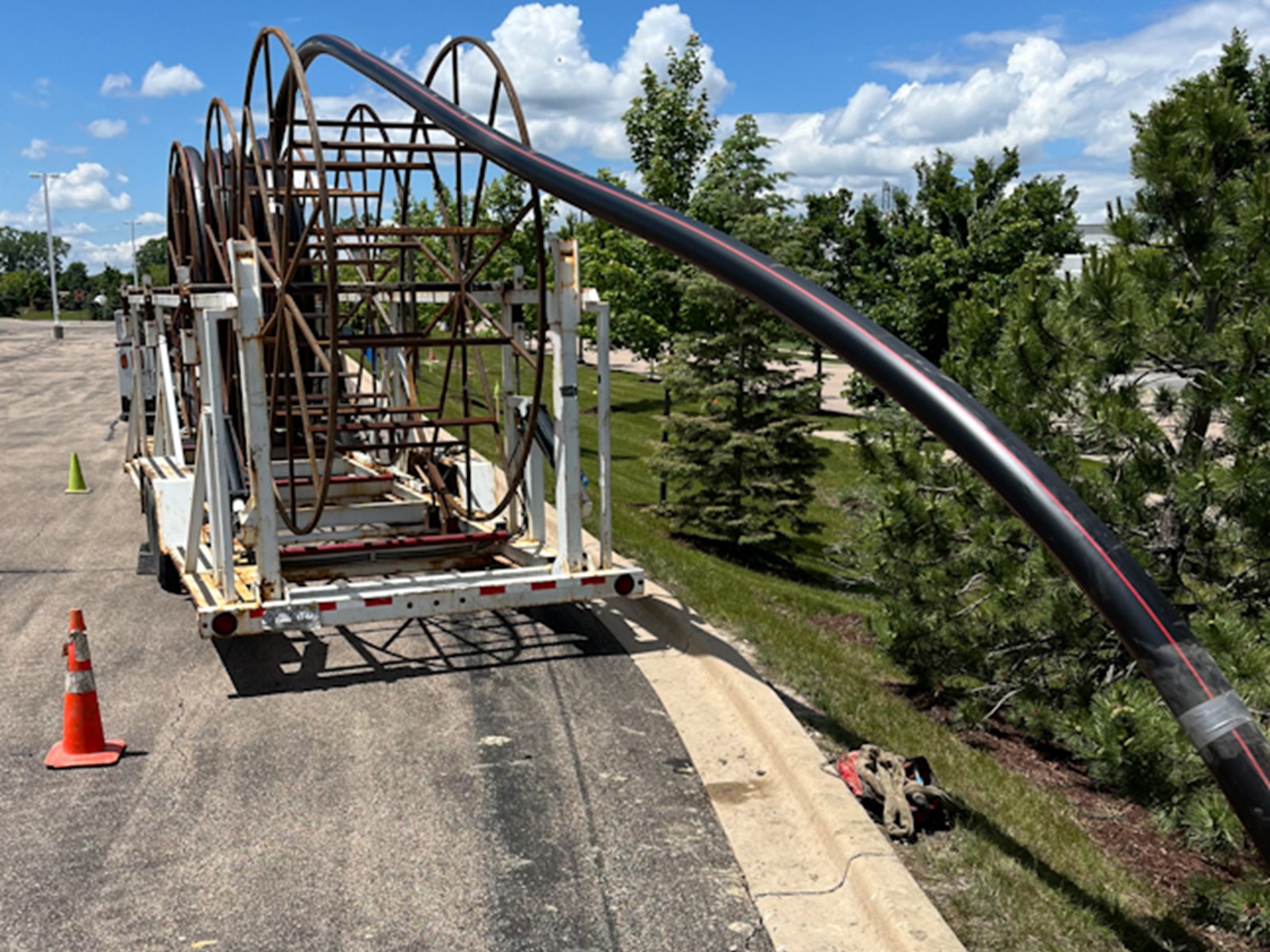 Unspooling Rack 5,000 ft. - 34 Kv. - Two Weeks | Electric Conduit Construction