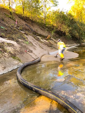 Managing drill mud with a hydro-vac unit