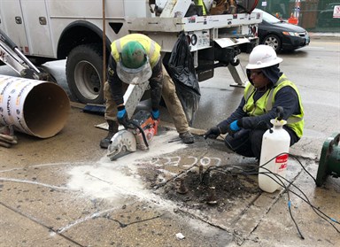 Saw cutting and breaking out sidewalk