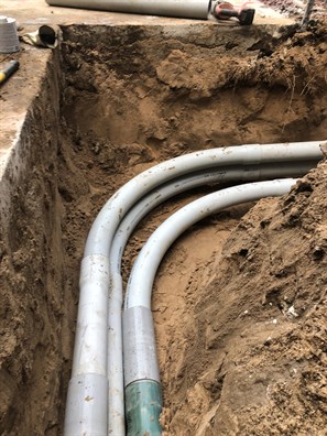Buried conduite carrying fiber and power to small cell site